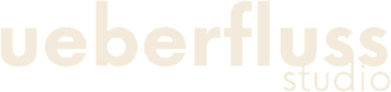 ueberfluss studio Logo